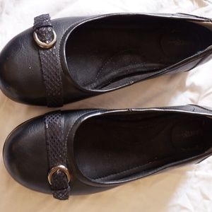 Black flats with buckle detail
